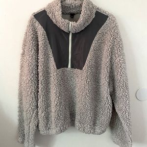 A cropped grey sweater size xxl